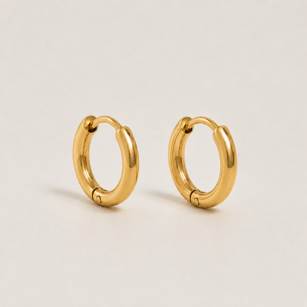 Elegante goldene Kreolen