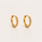 Elegante goldene Kreolen