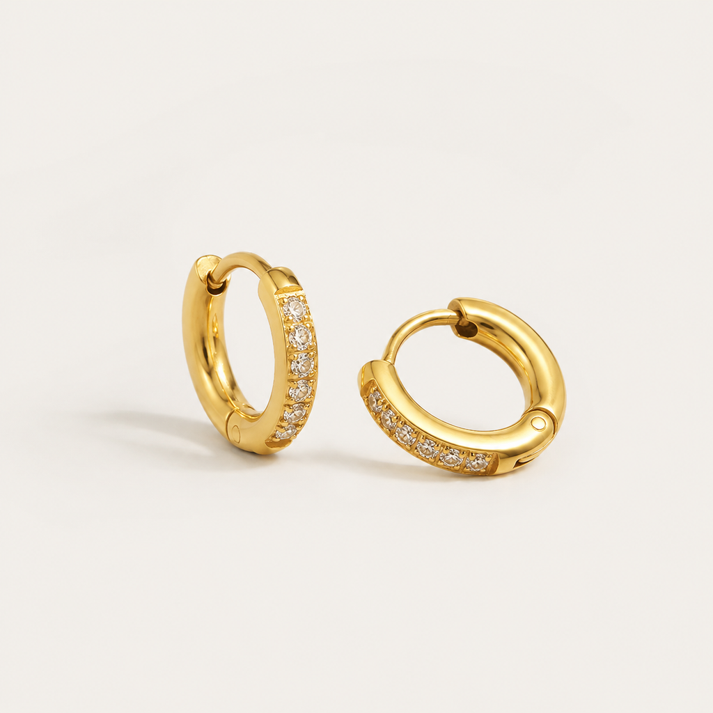 Elegante goldene Kreolen