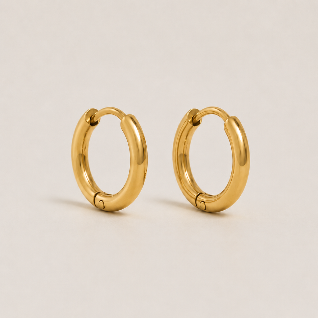 Elegante goldene Kreolen