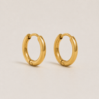 Elegante goldene Kreolen