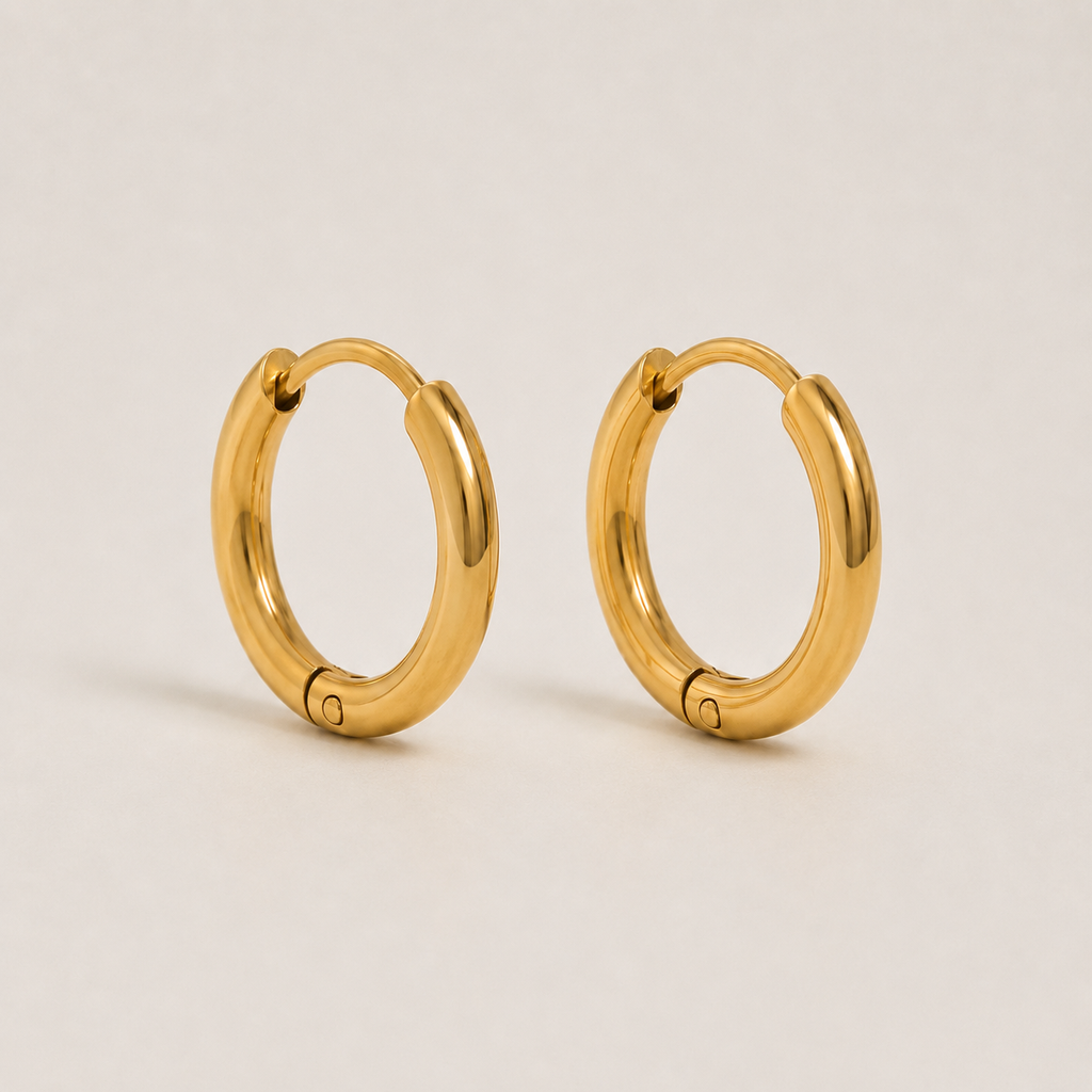 Elegante goldene Kreolen
