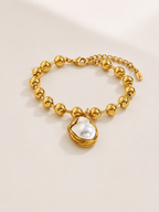 Elegantes Schmuckset mit Gold und Perlen