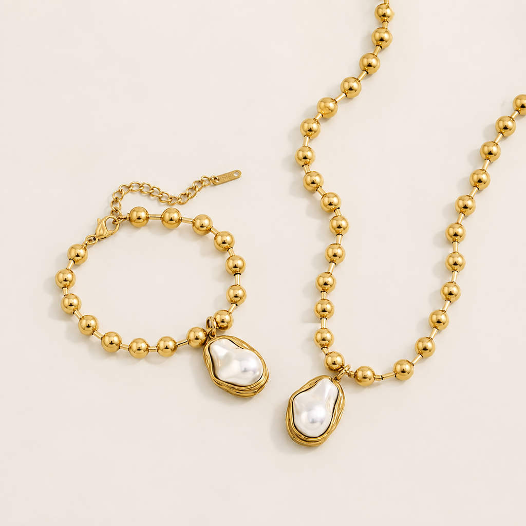 Elegantes Schmuckset mit Gold und Perlen